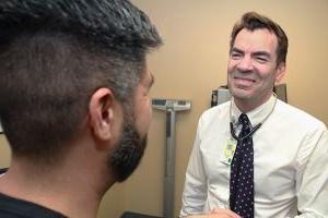 A doctor talking with a patient 